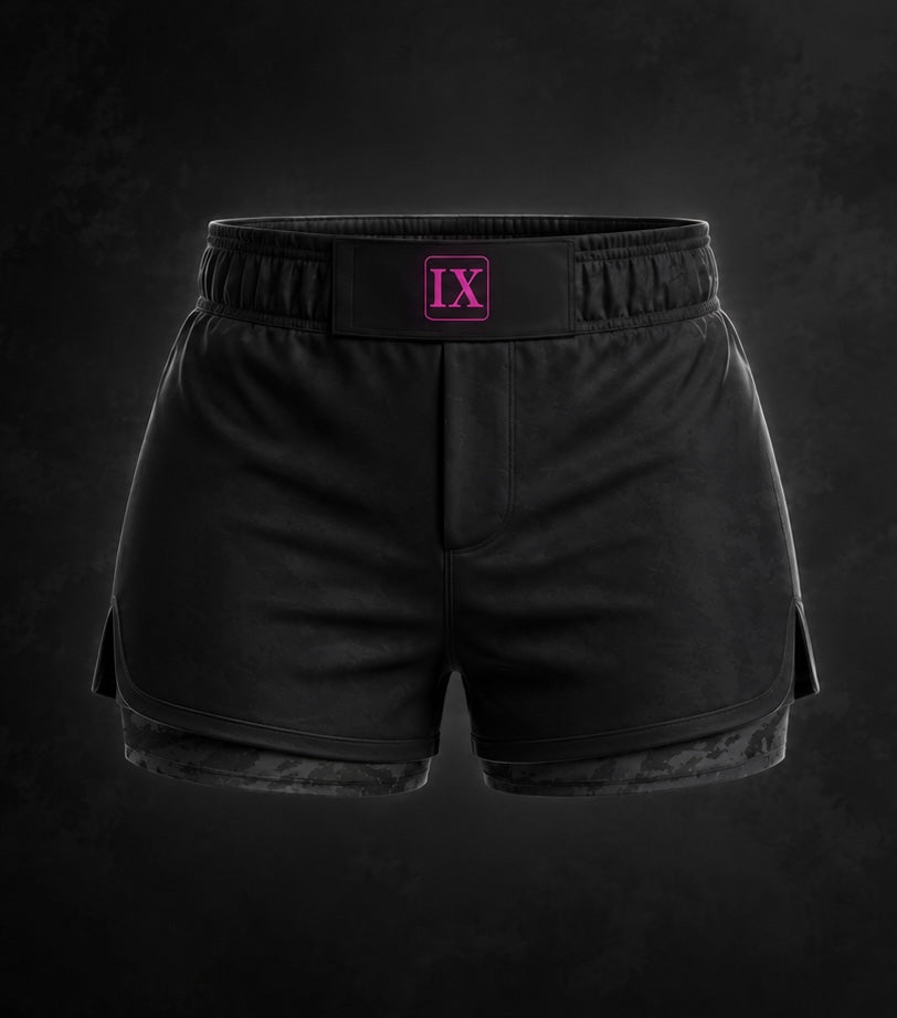 Charcoal camo and neon pink woman’s dual layer shorts