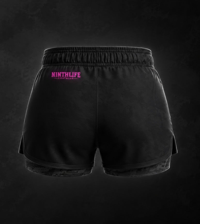 Charcoal camo and neon pink woman’s dual layer shorts