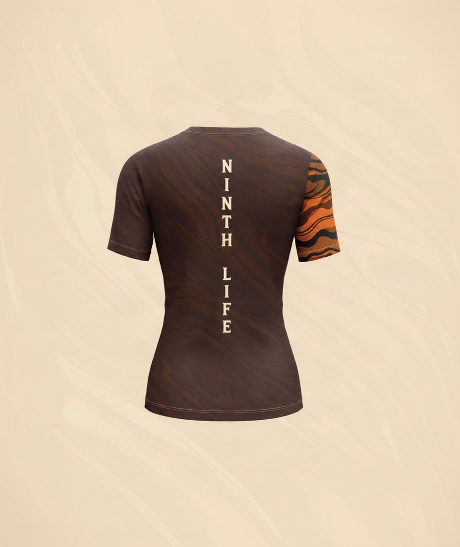 Brown & orange woman’s rashguard