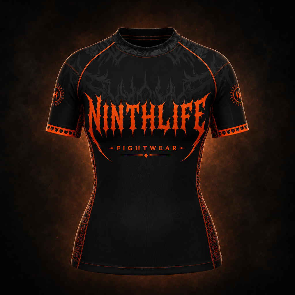 Black & neon orange woman’s Rashguard